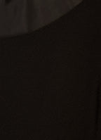 Close-up of black satin fabric texture