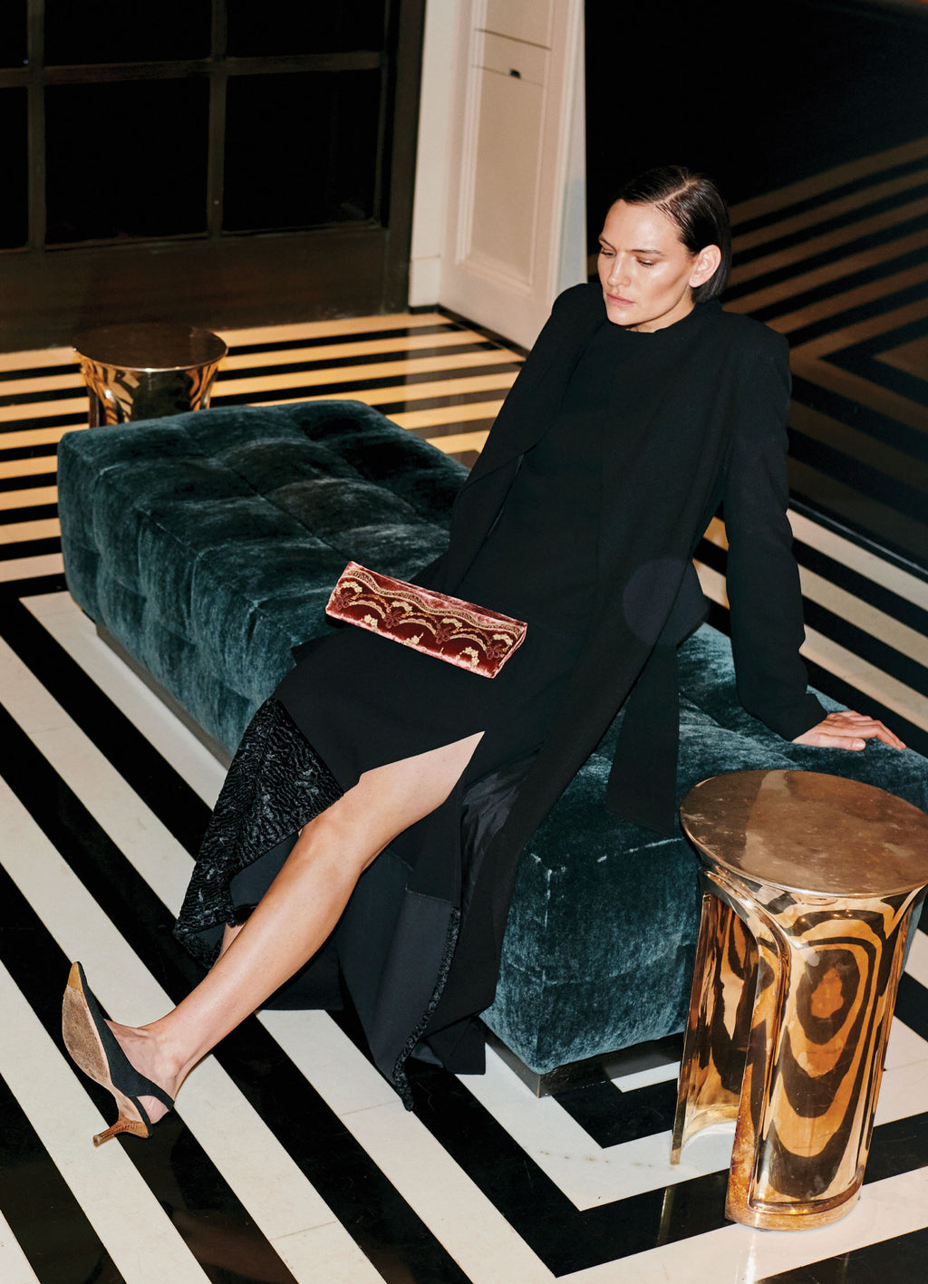 Black velvet-hem midi skirt styled for an evening look