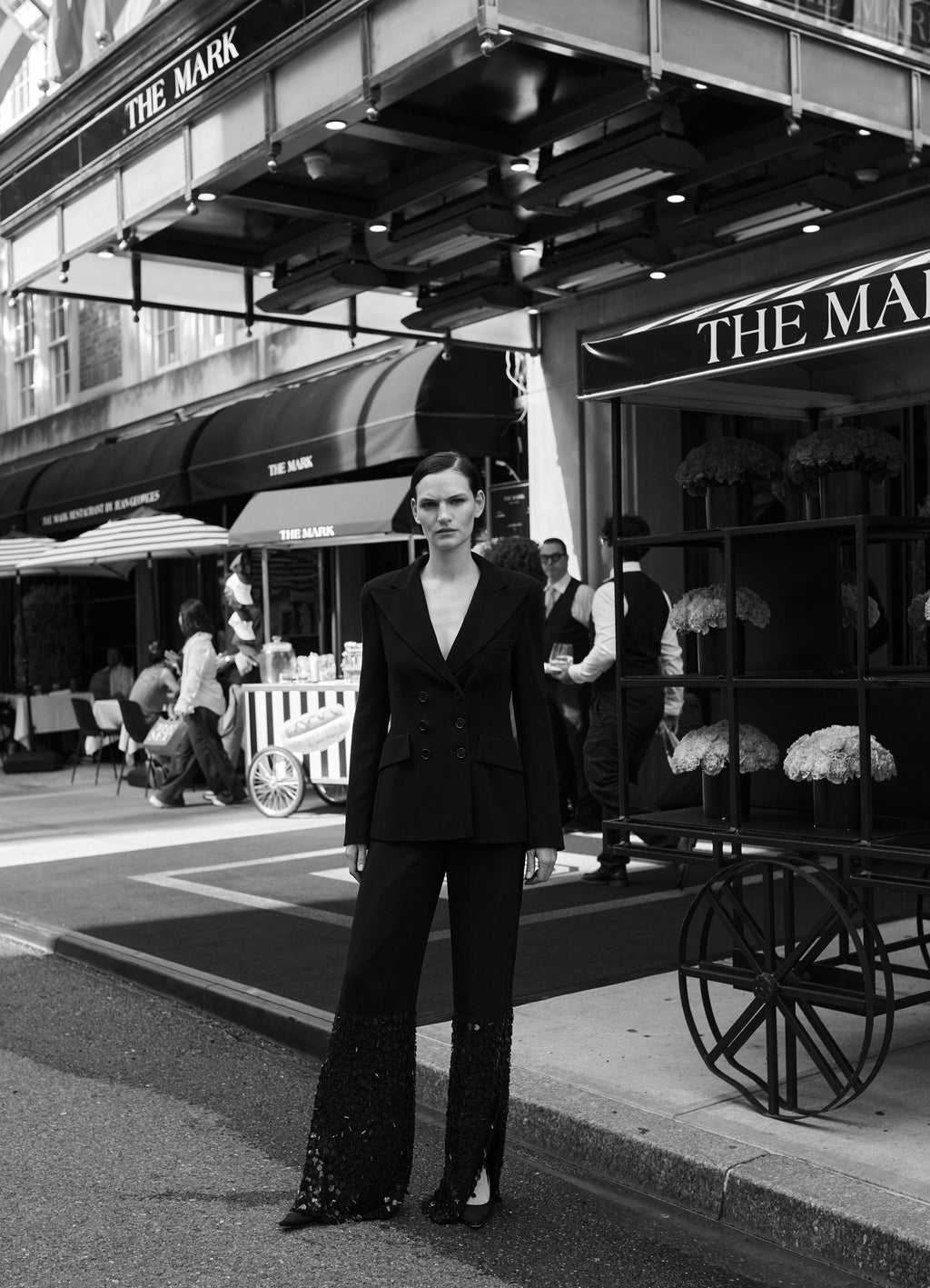 Model Sophie Grace Hirsch wearing SCHOENBACH double breasted blazer in front of the Mark Hotel in New York City 