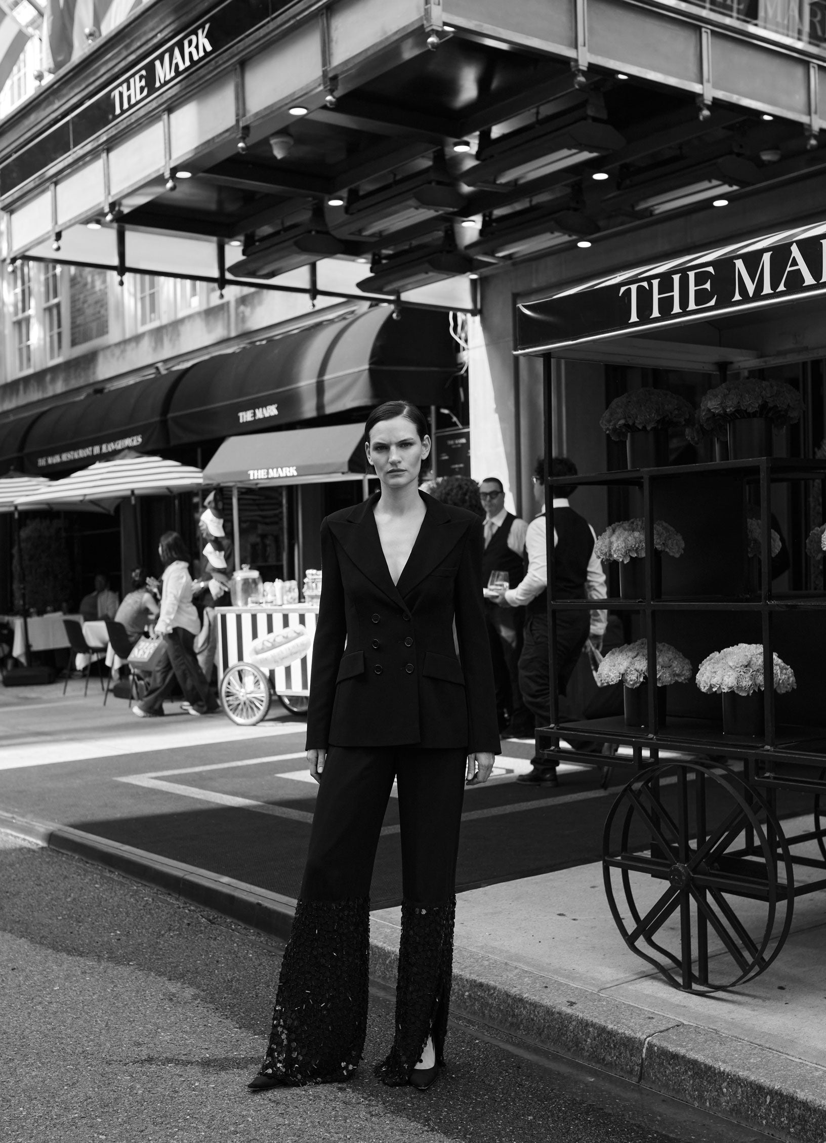 Model Sophie Grace Hirsch wearing SCHOENBACH double breasted blazer in front of the Mark Hotel in New York City 