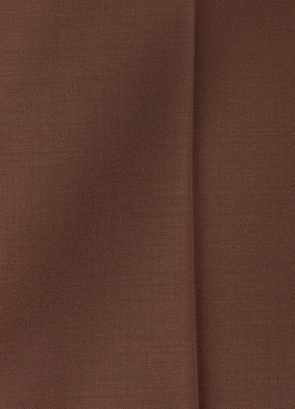 Close-up of chocolate brown wool trousers