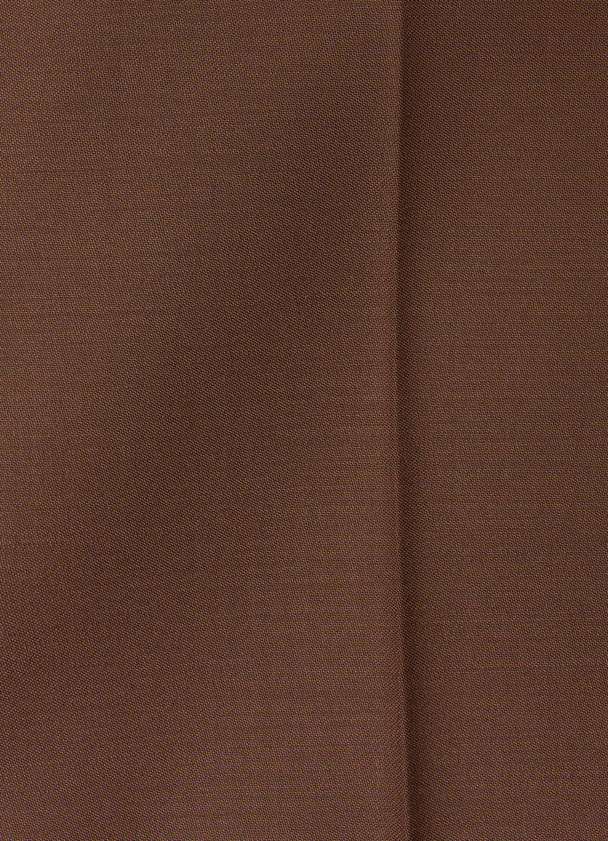 Close-up of chocolate brown wool trousers