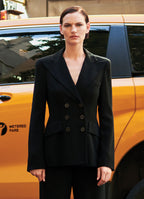 Black SCHOENBACH double-breasted blazer worn with black trousers