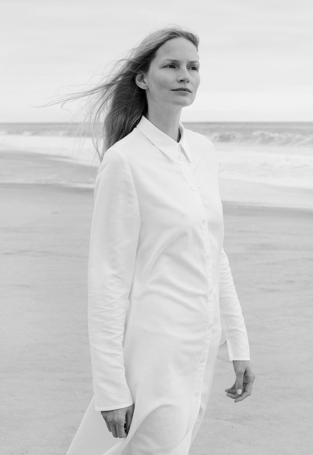 SCHOENBACH editorial shoot with model Katrin Thormann walking on the beach