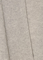 Close-up detail of the grey mélange cashmere knit texture and soft brushed finish.