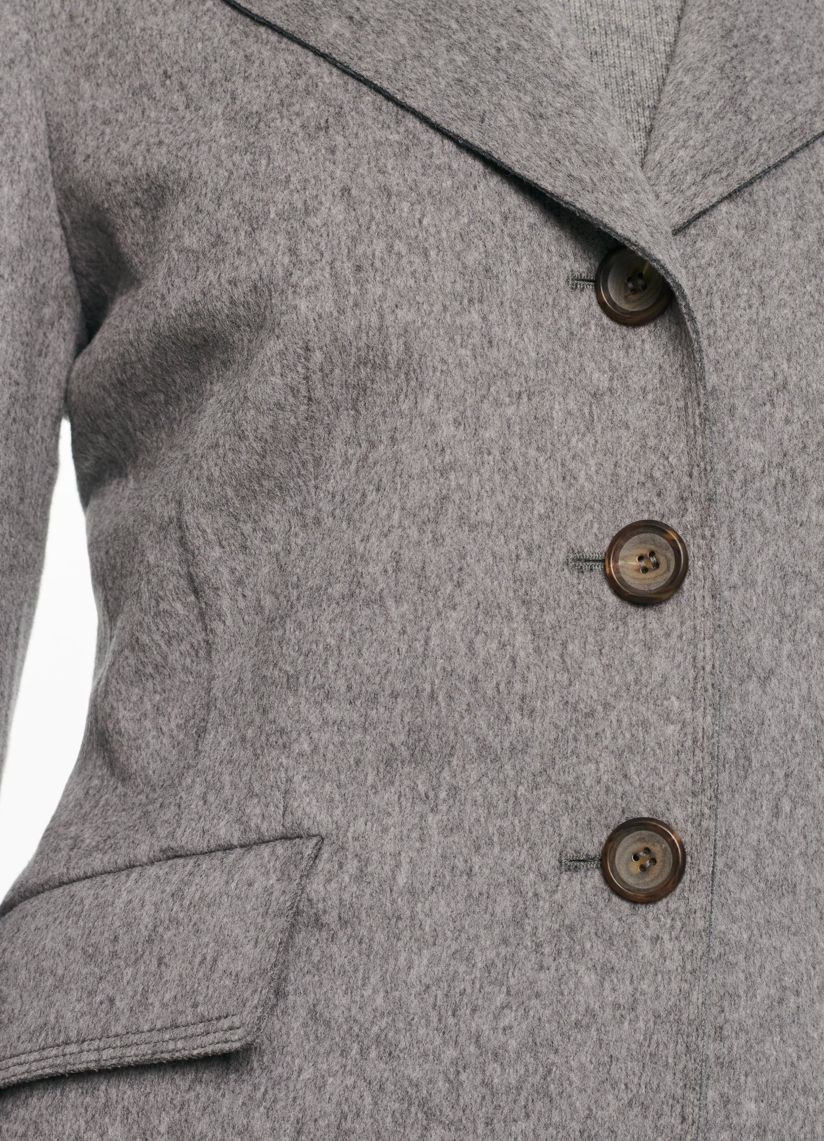 Close-up of SCHOENBACH wool jacket buttons in grey melange Loro Piana fabric