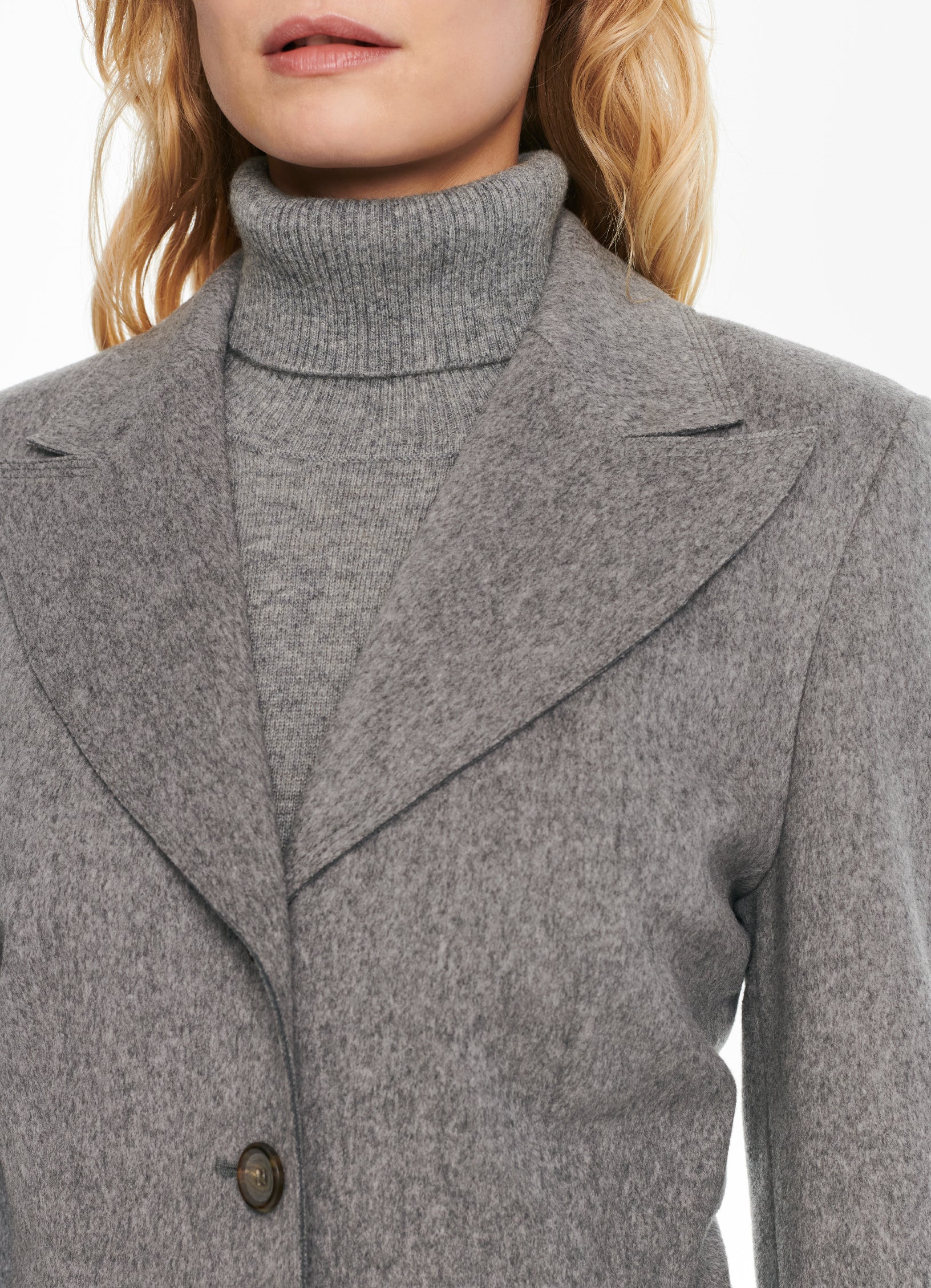 Detail of SCHOENBACH grey wool jacket with wide peak lapels and tailored front