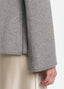 Close-up of SCHOENBACH wool jacket sleeve in grey melange with clean tailored cuff