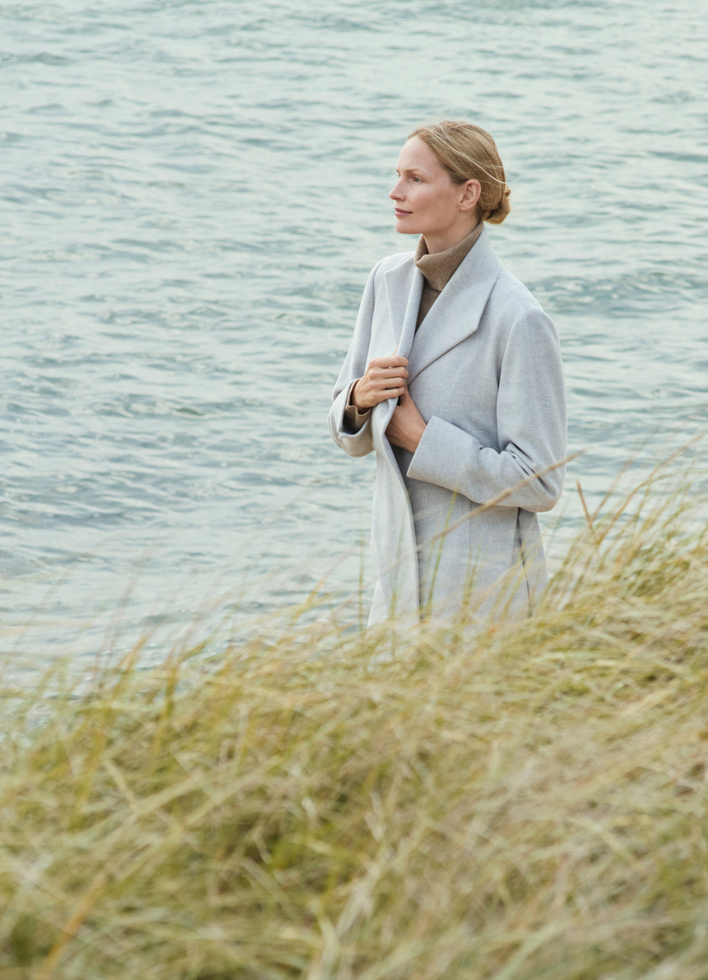 Light grey wool-cashmere coat in a natural setting