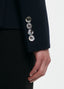 Close-up of SCHOENBACH navy virgin wool jacket cuff with button detailing