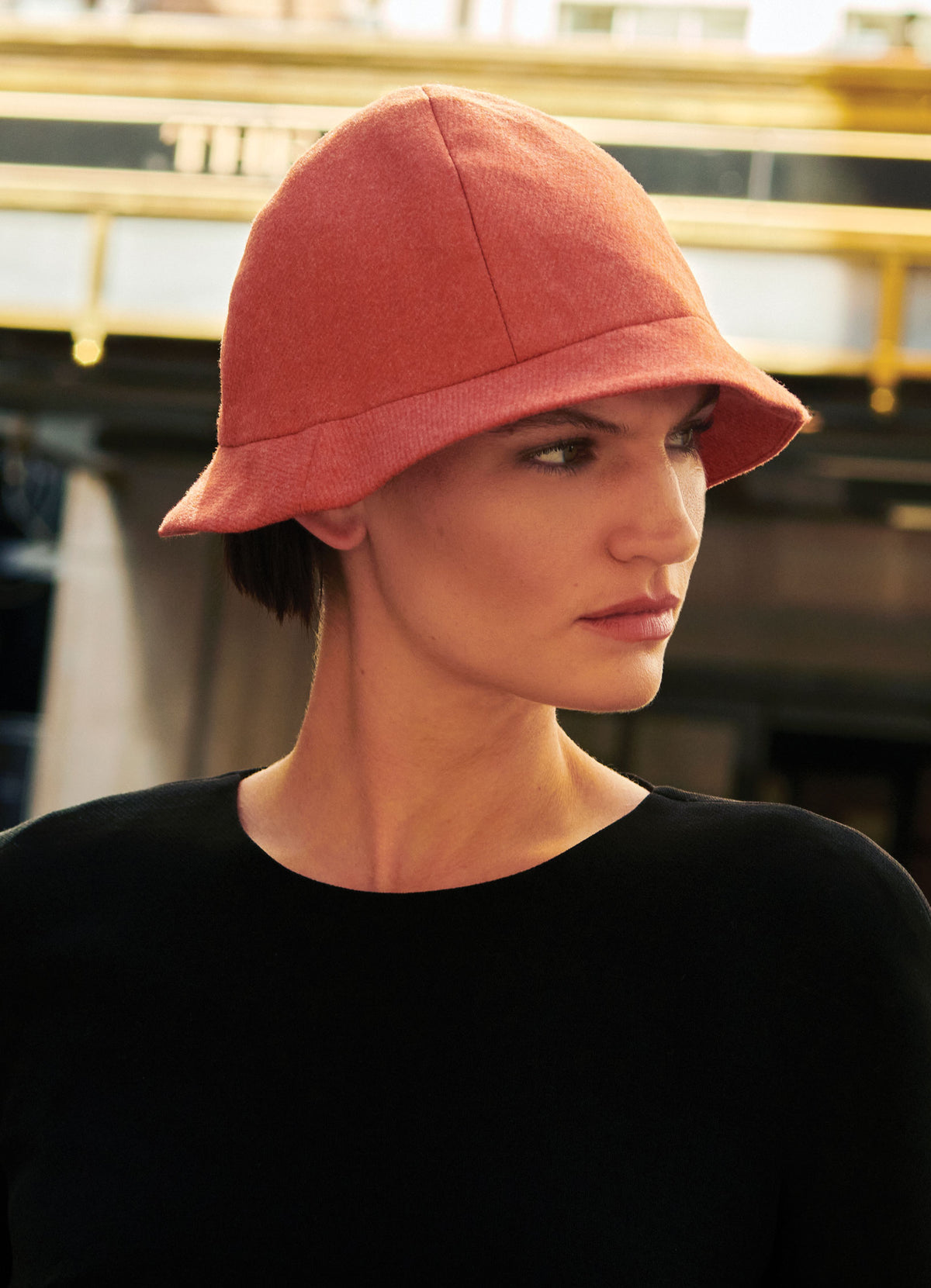 SCHOENBACH orange cashmere hat worn by a model Sophie Grace Hirsch