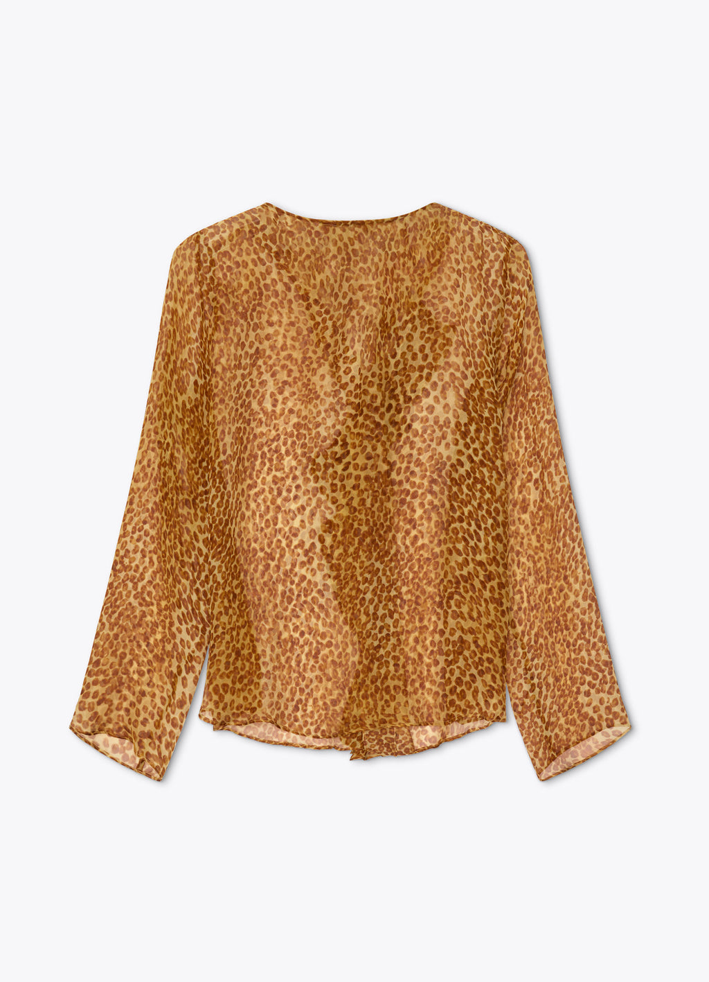 Back view of silk blouse in abstract ozelot print with fluid silhouette