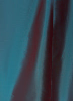 Silk taffeta long skirt in petrol detail showing structured texture and seam finish