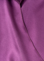Satin wrap blouse in light purple detail of smooth satin fabric and wrap seam