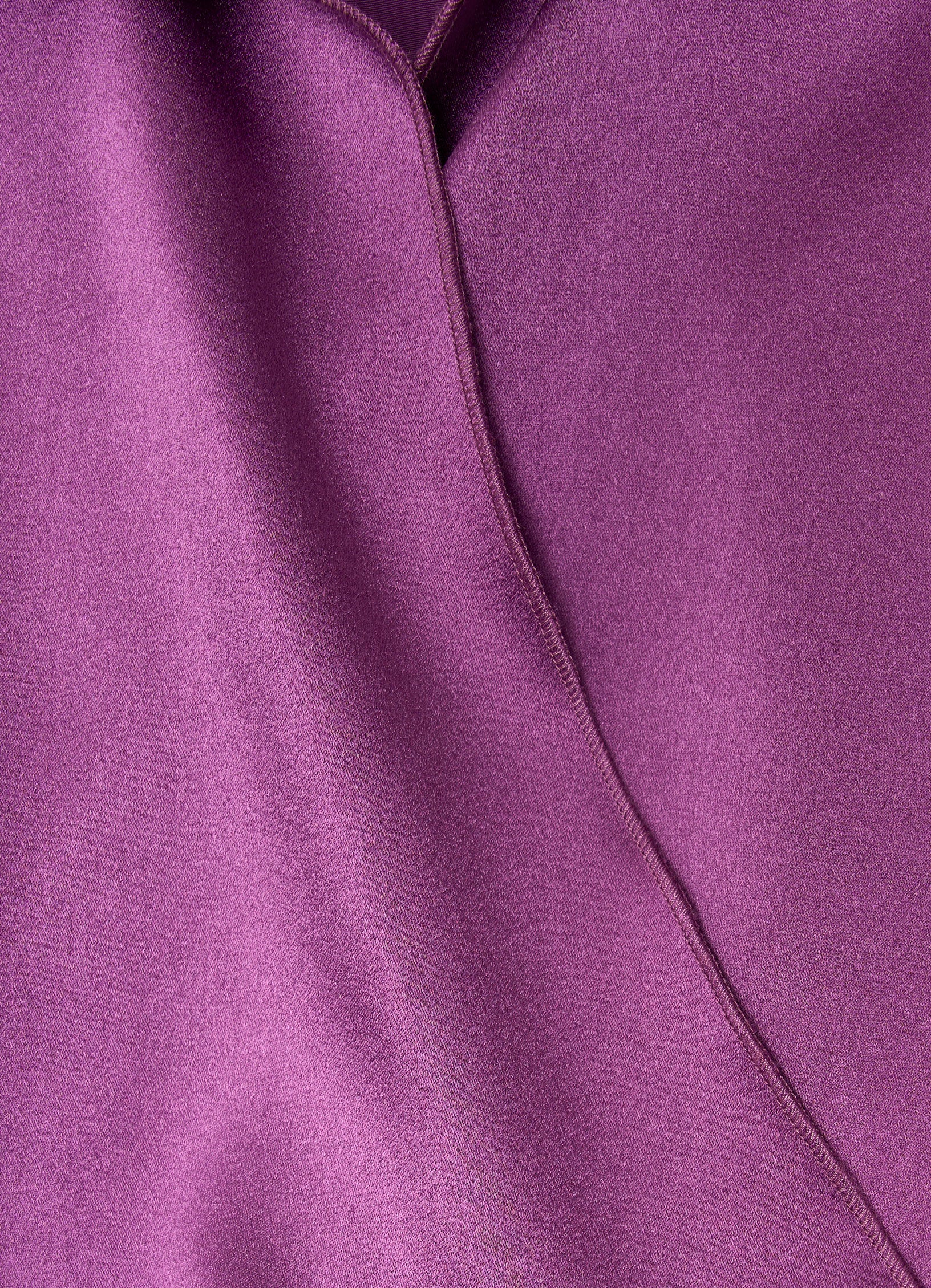 Satin wrap blouse in light purple detail of smooth satin fabric and wrap seam