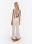SCHOENBACH signature silk wrap blouse in beige three quarter view