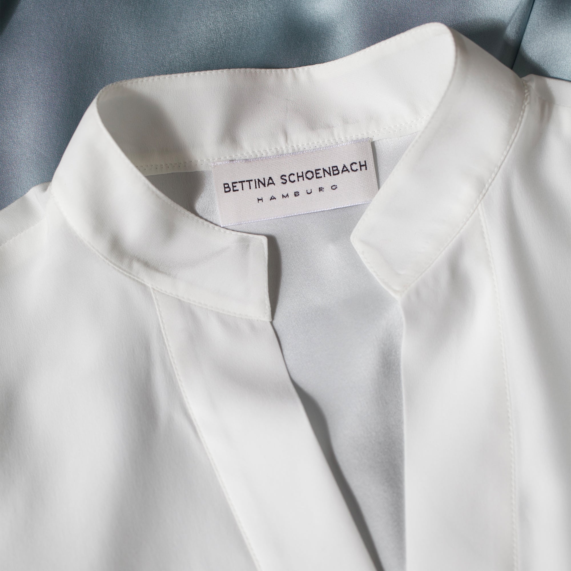 SCHOENBACH silk blouse detail highlighting refined collar construction and fabric