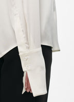 SCHOENBACH silk blouse in white, elongated cuff detail